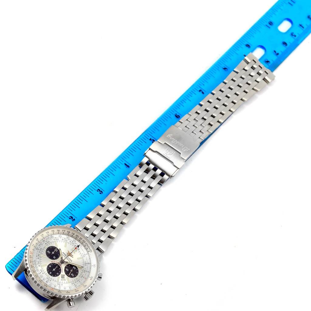 The image shows a Breitling Navitimer A41322 Men's Stainless Steel Silver Dial A41322 Men's Stainless Steel Silver Dial watch laid out flat beside a ruler, displaying its face and full metal bracelet.