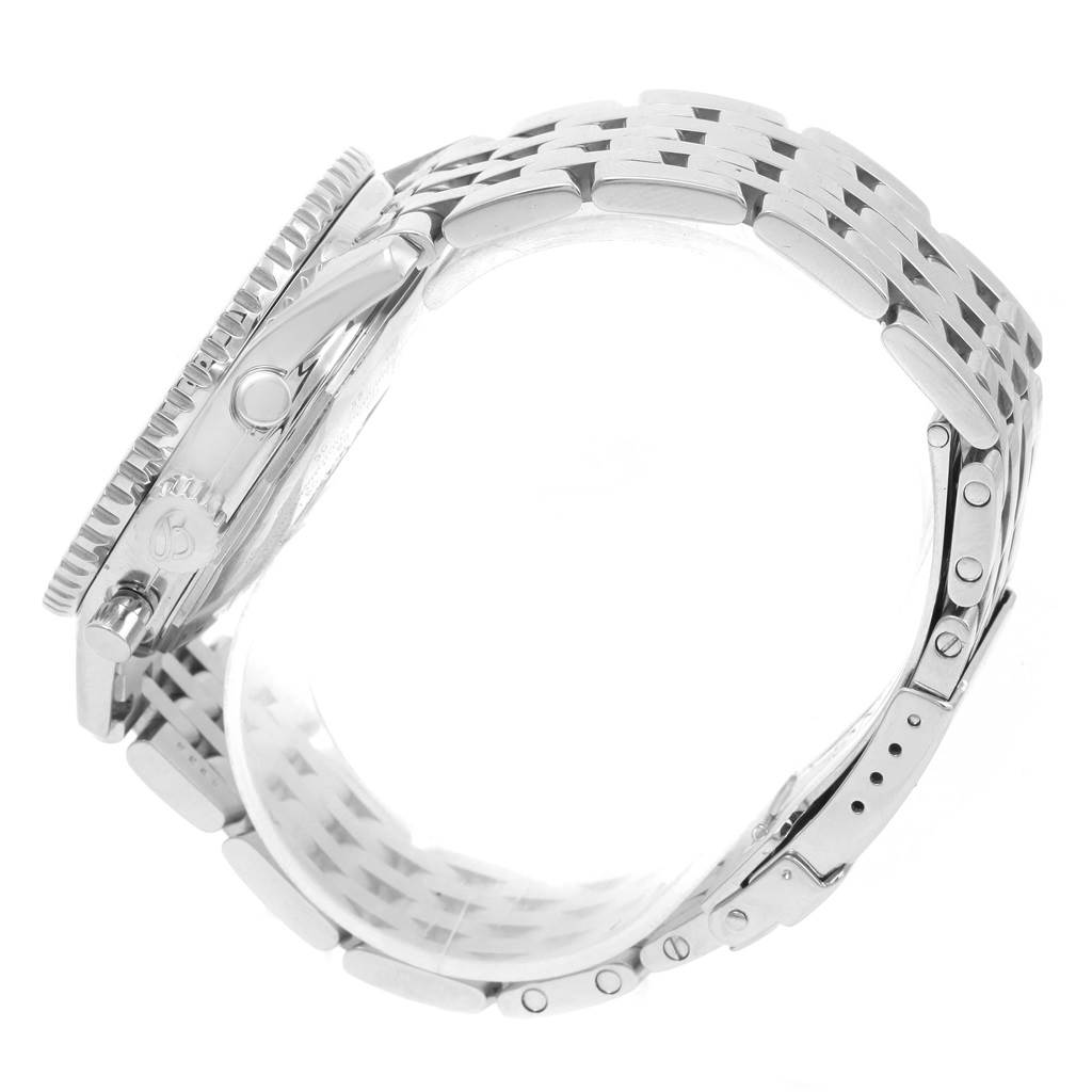 The image shows a side view of a Breitling Navitimer A13322 Men's Stainless Steel Blue Dial A13322 Men's Stainless Steel Blue Dial watch, focusing on the bezel, crown, and metal bracelet.