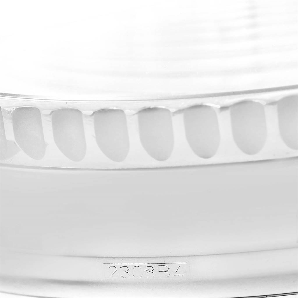 The image shows a close-up of the case and bezel teeth of a Breitling Navitimer A21330 Men's Stainless Steel Silver Dial A21330 Men's Stainless Steel Silver Dial watch.