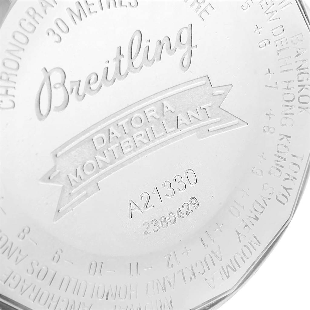 The image shows the engraved back case of a Breitling Navitimer A21330 Men's Stainless Steel Silver Dial A21330 Men's Stainless Steel Silver Dial Datora Montbrillant watch.