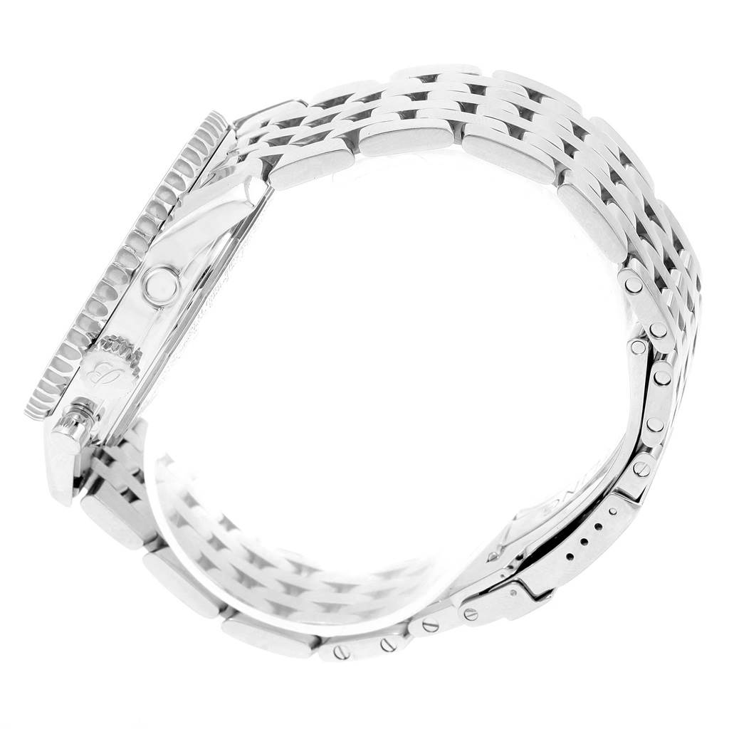 The image shows a side view of a Breitling Navitimer A21330 Men's Stainless Steel Silver Dial A21330 Men's Stainless Steel Silver Dial watch, highlighting its case, beveled bezel, and metal link bracelet.