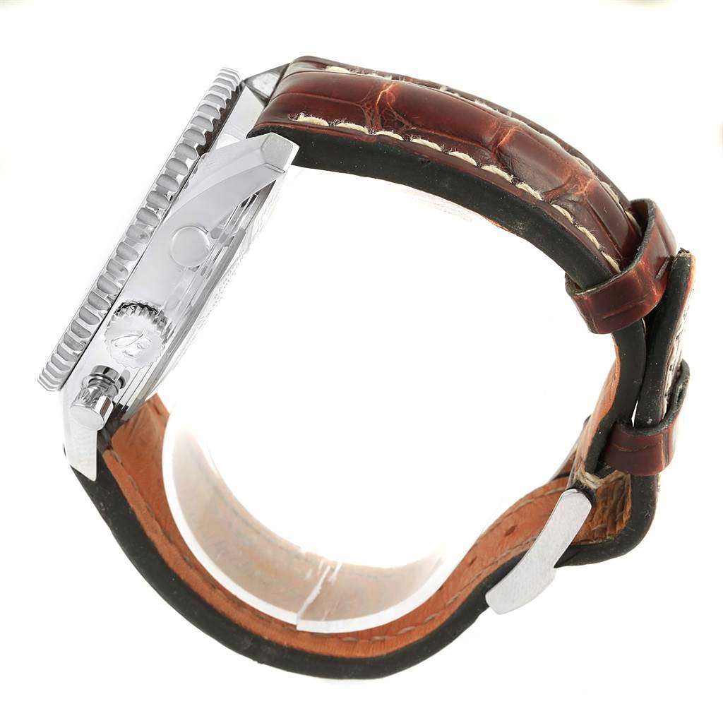 This side view of the Breitling Navitimer A24322 Men
s Stainless Steel Black Dial A24322 Men
s Stainless Steel Black Dial watch shows its case, crown, bezel, and brown leather strap.