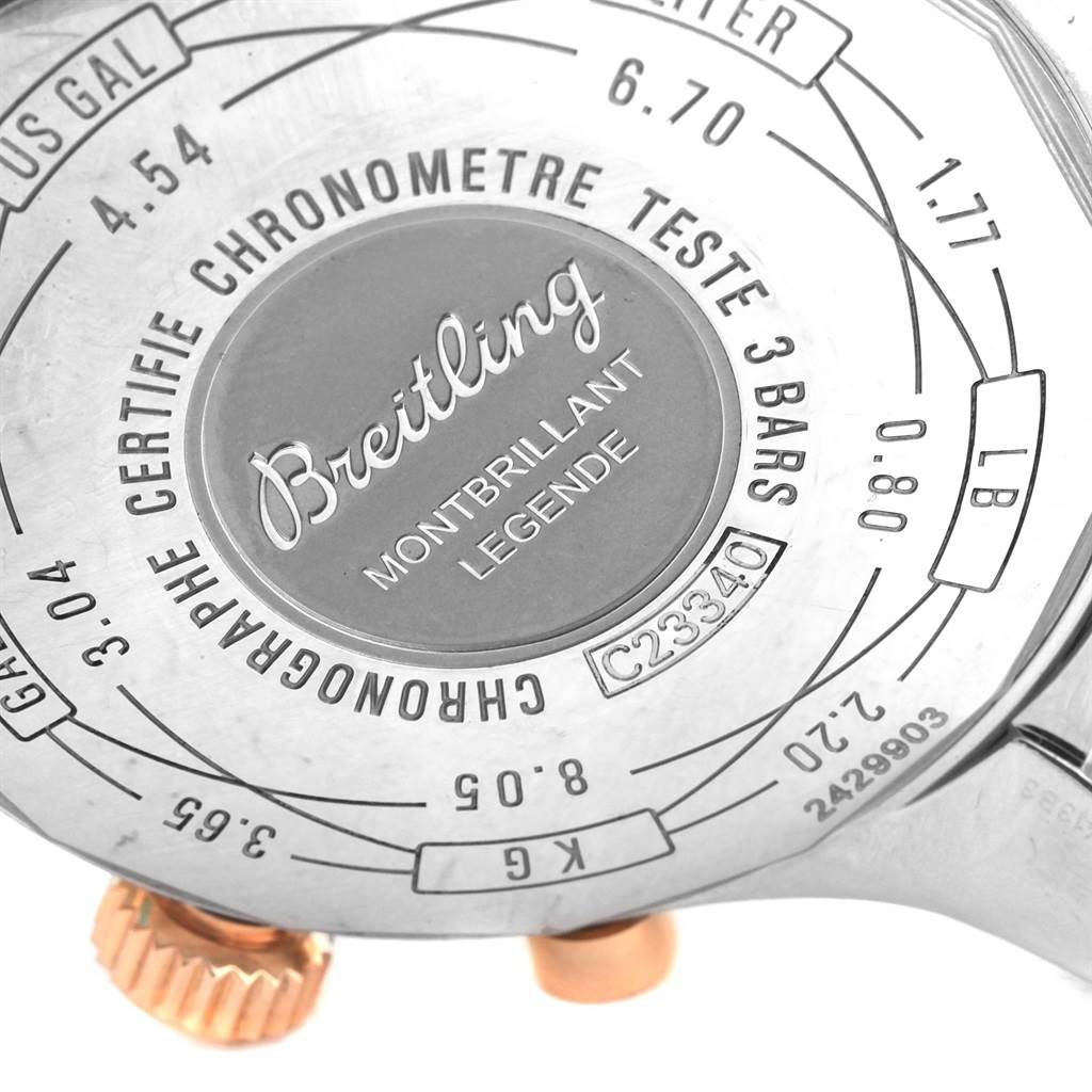 This image shows the case back of a Breitling Navitimer C23340 Men
s Steel and Gold (two tone) Black Dial C23340 Men
s Steel and Gold (two tone) Black Dial Montbrillant Légende watch, featuring its engravings and crown.