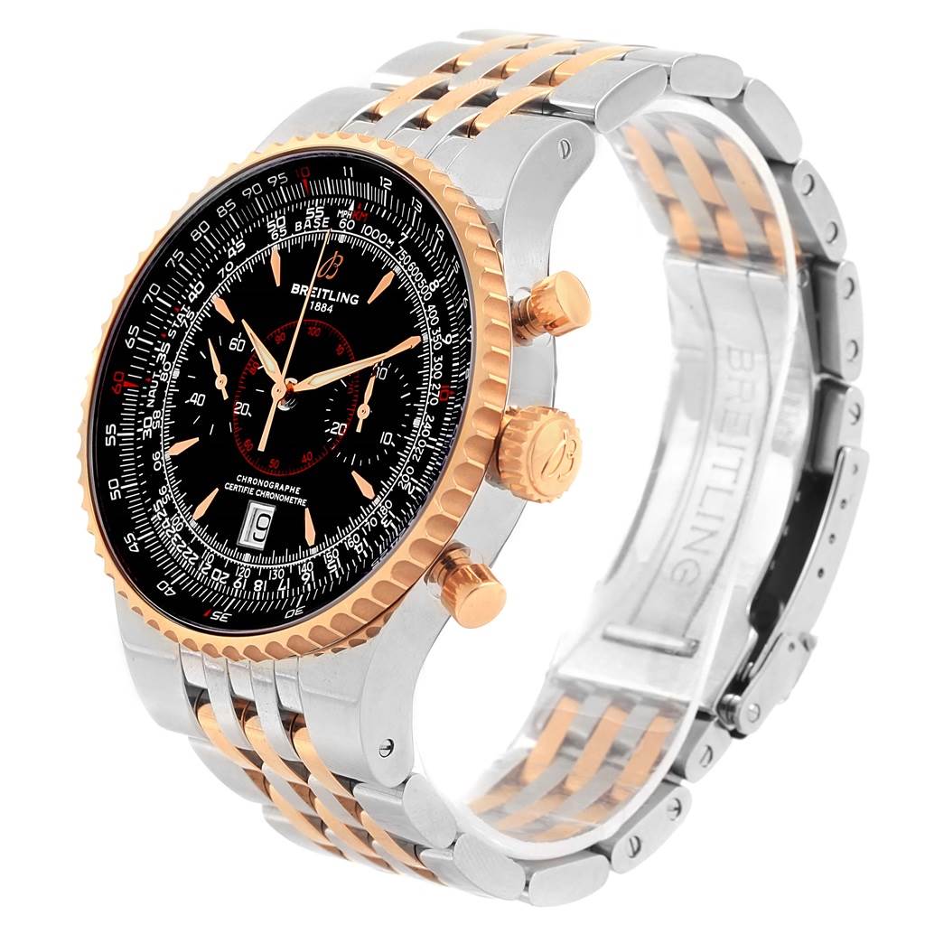 The image shows a Breitling Navitimer C23340 Men
s Steel and Gold (two tone) Black Dial C23340 Men
s Steel and Gold (two tone) Black Dial watch at a three-quarter angle, highlighting its face, bezel, crown, pushers, and bracelet.