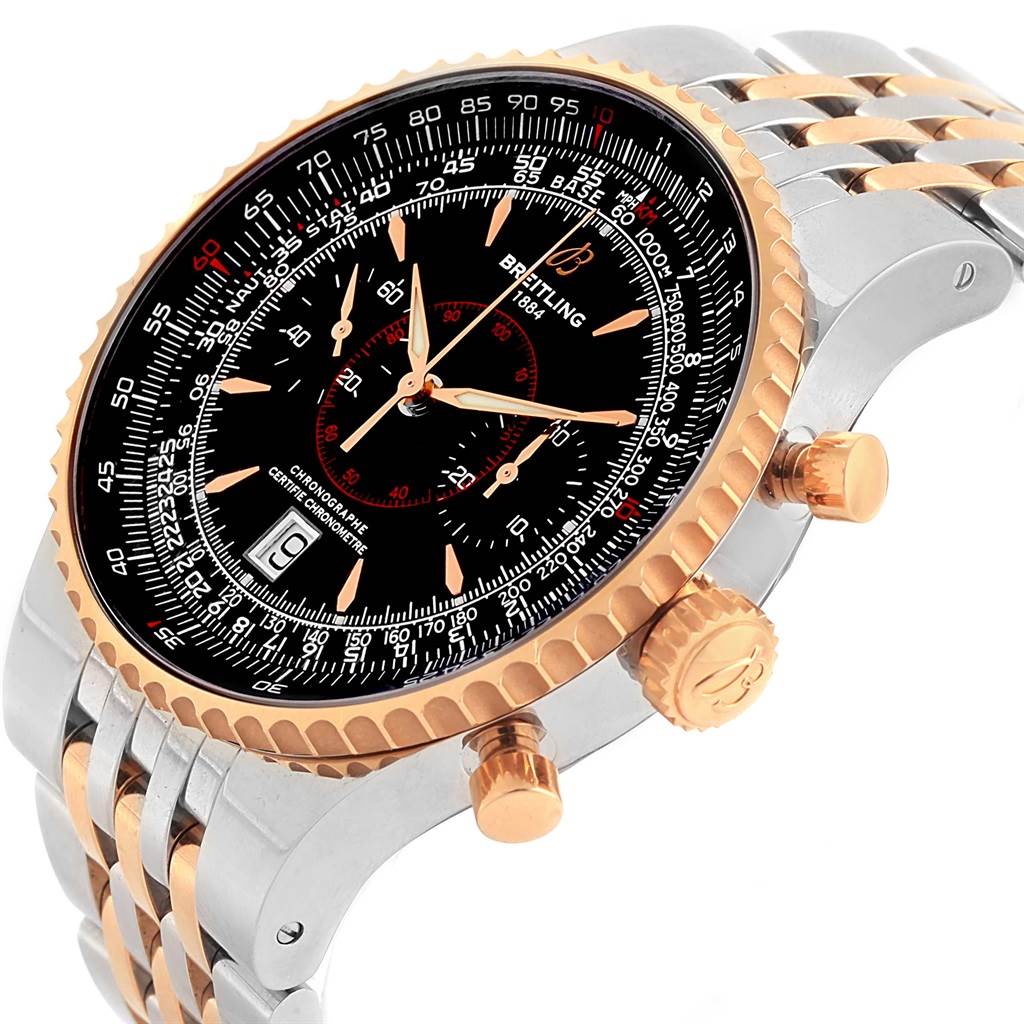 The Breitling Navitimer C23340 Men
s Steel and Gold (two tone) Black Dial C23340 Men
s Steel and Gold (two tone) Black Dial watch is shown at an angled side view, highlighting the bezel, dial, crown, chronograph pushers, and bracelet.