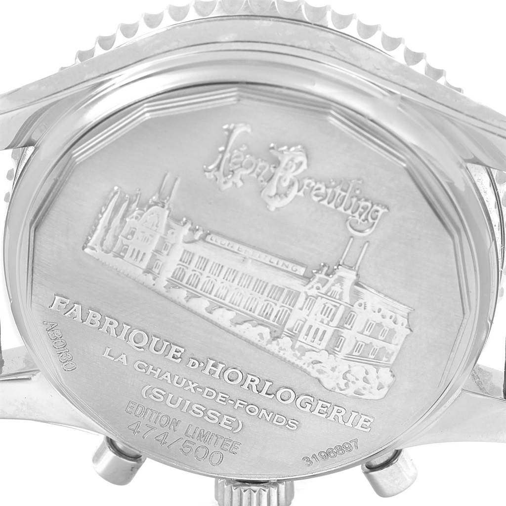 The image shows the back case of a Breitling Navitimer AB0130 Men's Stainless Steel Blue Dial AB0130 Men's Stainless Steel Blue Dial watch taken at an angle highlighting the engraved details and serial number.