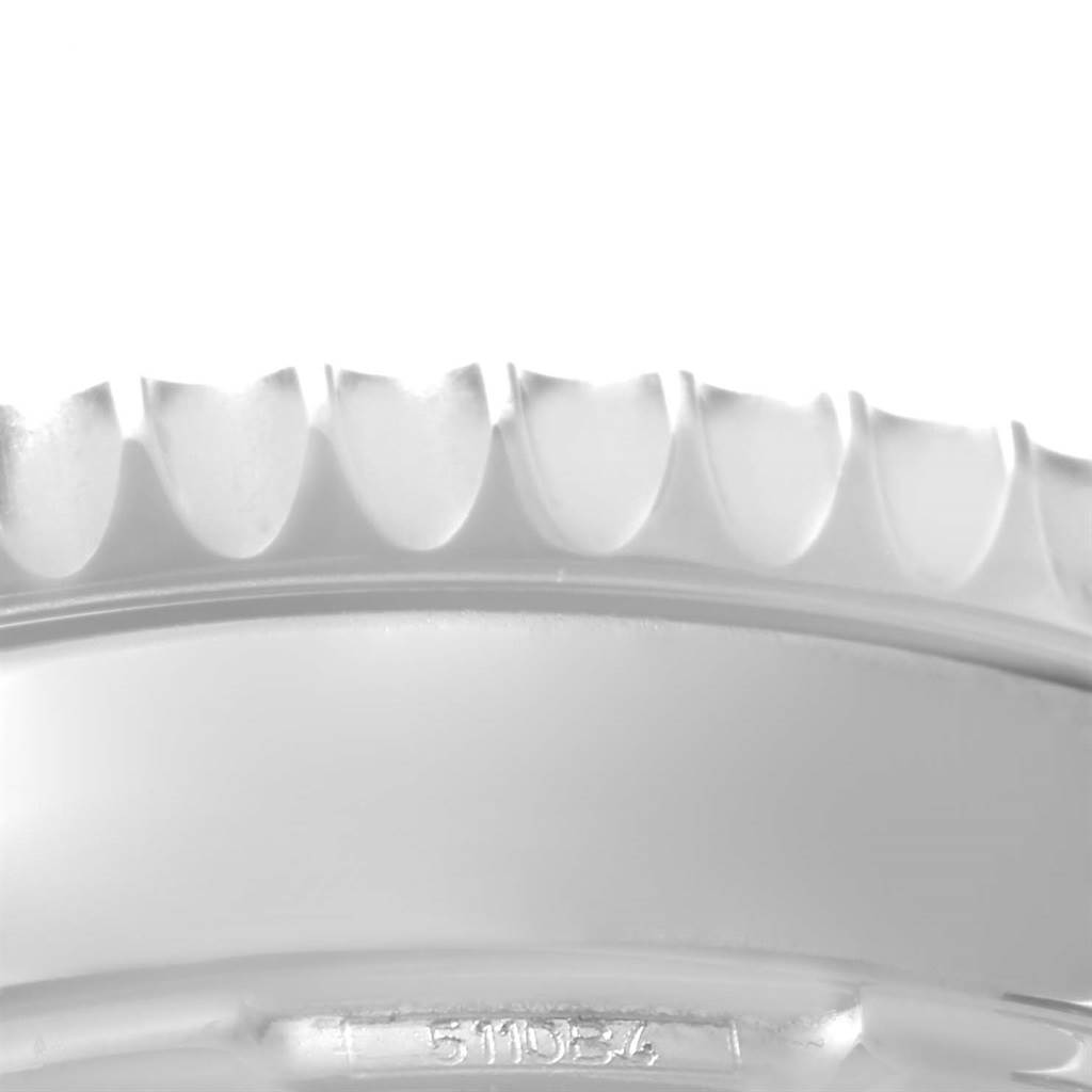 This image shows a close-up of the bezel edge from a Breitling Navitimer AB0131 Men's Stainless Steel Silver Dial AB0131 Men's Stainless Steel Silver Dial watch.