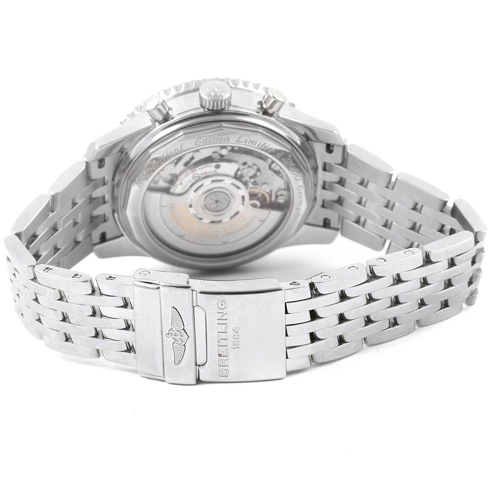 The image shows the back side of a Breitling Navitimer AB0131 Men's Stainless Steel Silver Dial AB0131 Men's Stainless Steel Silver Dial watch, highlighting the stainless steel bracelet and transparent case back.