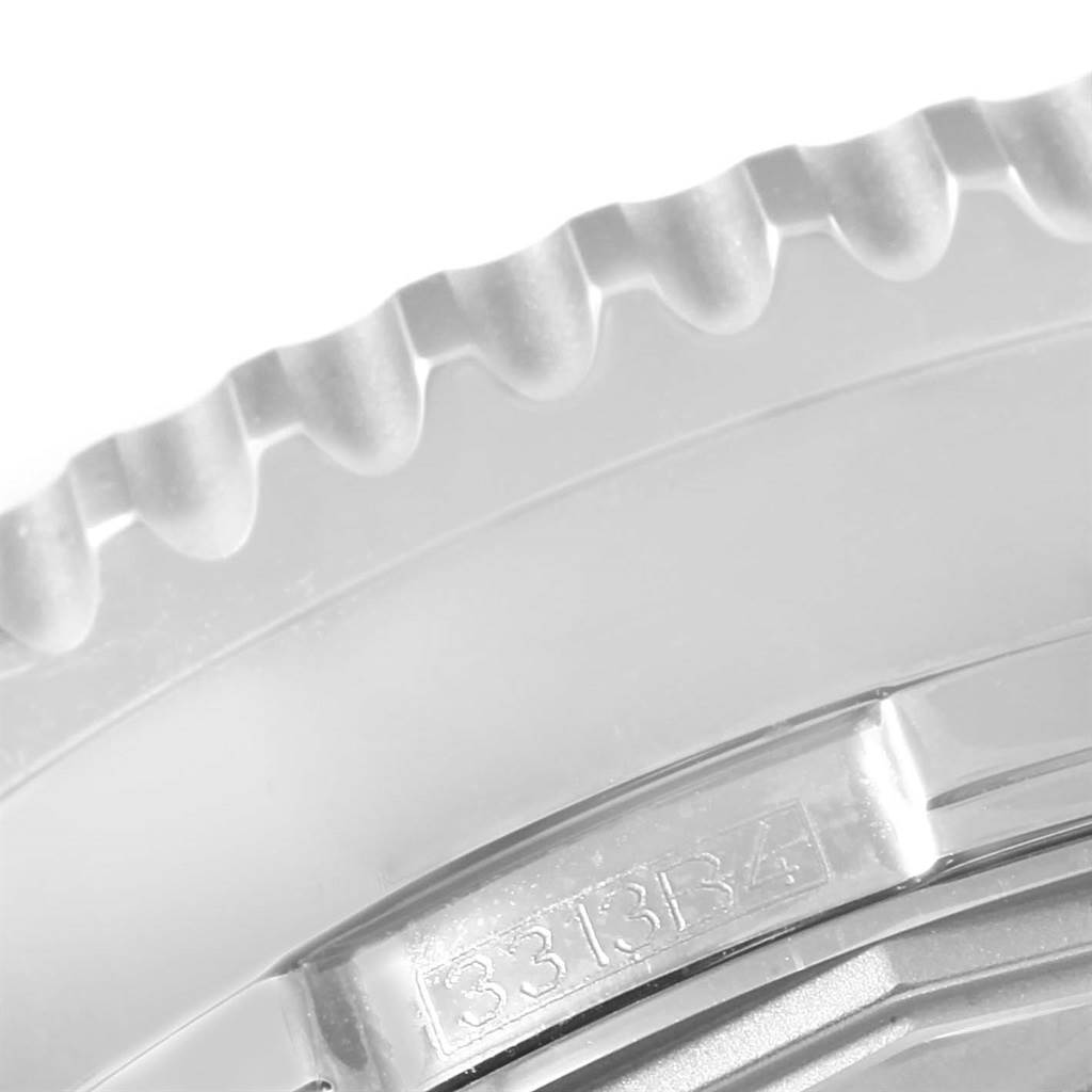 This close-up image showcases the bezel and part of the case back of the Breitling Navitimer A19370 Men's Stainless Steel Blue Dial A19370 Men's Stainless Steel Blue Dial watch.