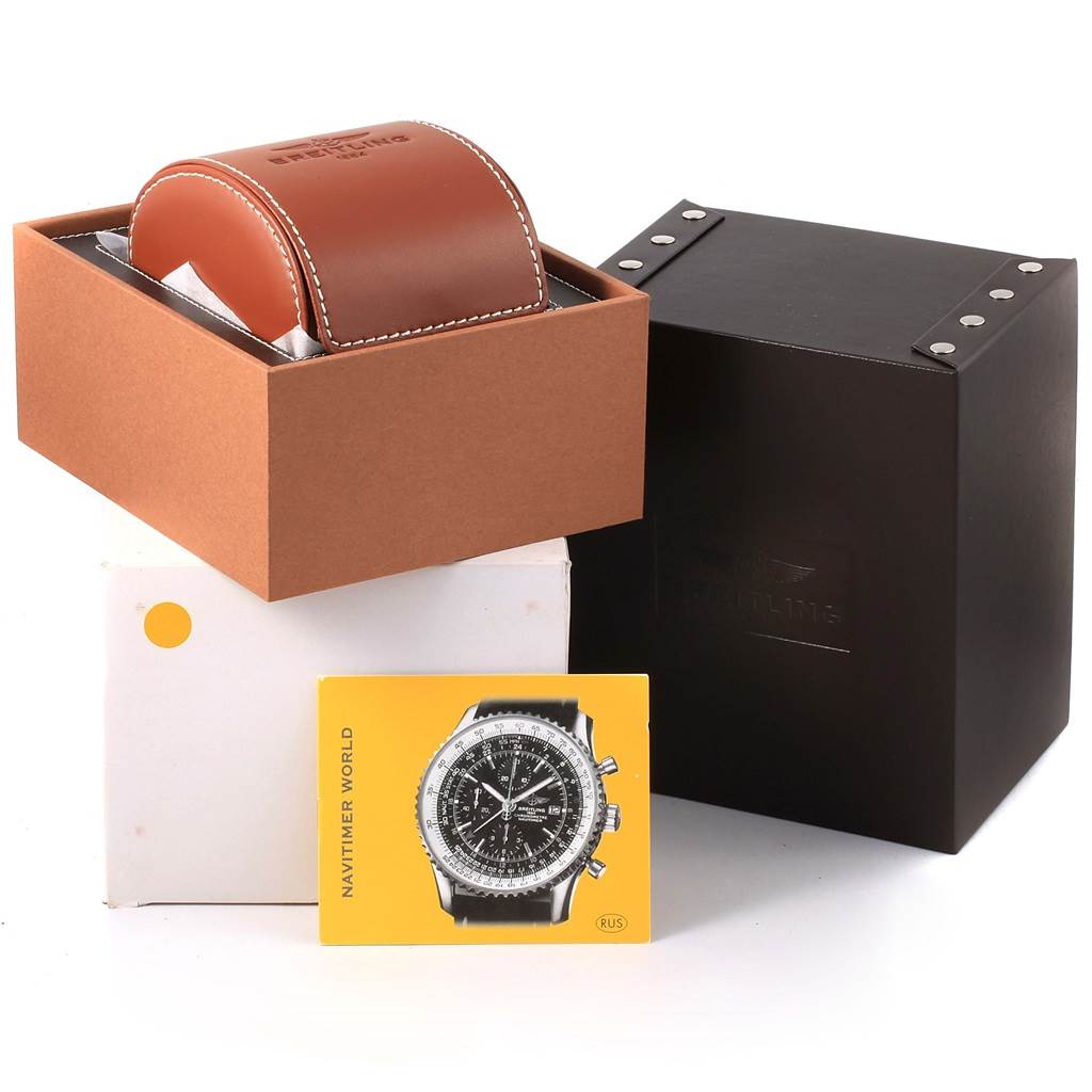The image shows the packaging and accessories for a Breitling Navitimer A19370 Men's Stainless Steel Blue Dial A19370 Men's Stainless Steel Blue Dial watch, including a leather case, a black box, and a brochure.