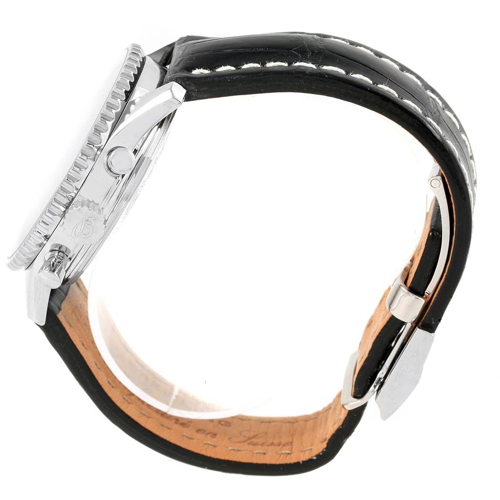 The image shows a side view of a Breitling Navitimer AB0120 Men
s Stainless Steel Black Dial AB0120 Men
s Stainless Steel Black Dial watch, highlighting the bezel, crown, pushers, and leather strap with stitching.