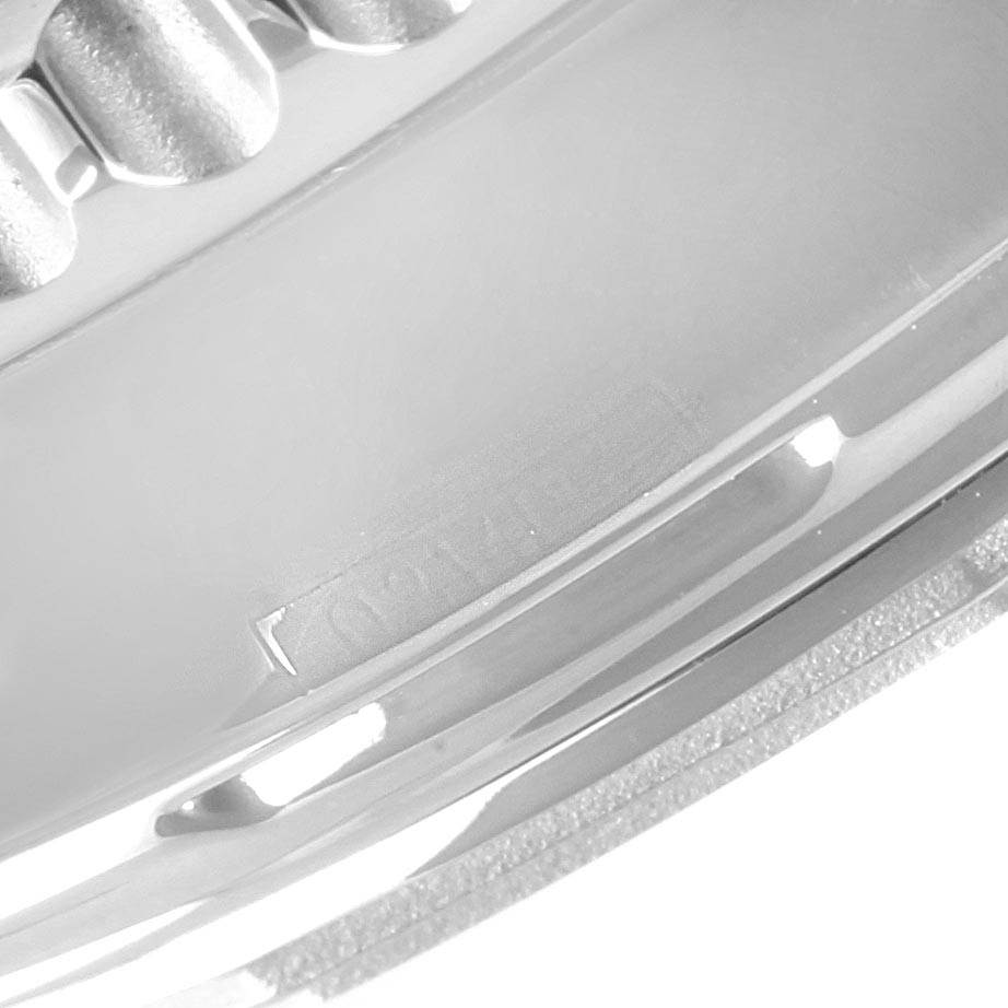 This image shows a close-up of the bezel from the side of a Breitling Navitimer AB0120 Men
s Stainless Steel Black Dial AB0120 Men
s Stainless Steel Black Dial watch.