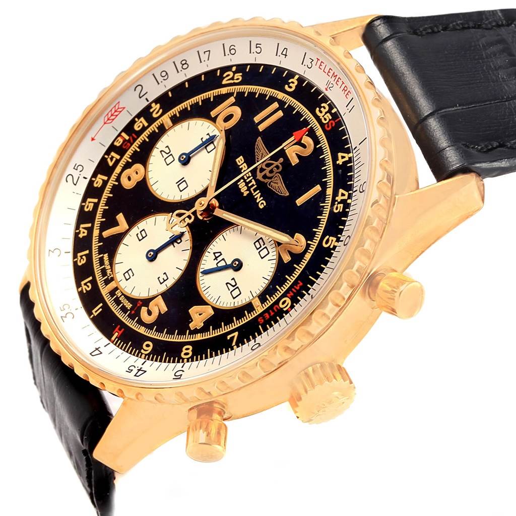 The image shows a close-up of the Breitling Navitimer K30021 Men
s Rose Gold Black Dial K30021 Men
s Rose Gold Black Dial watch, focusing on its dial, bezel, pushers, and part of the leather strap.