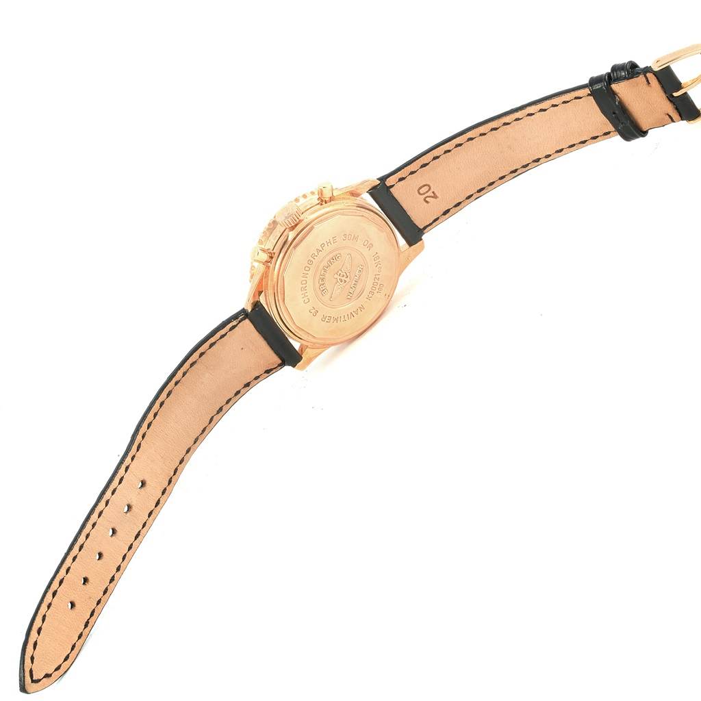 The image shows the back case and leather strap of the Breitling Navitimer K30021 Men
s Rose Gold Black Dial K30021 Men
s Rose Gold Black Dial watch, viewed from the underside.