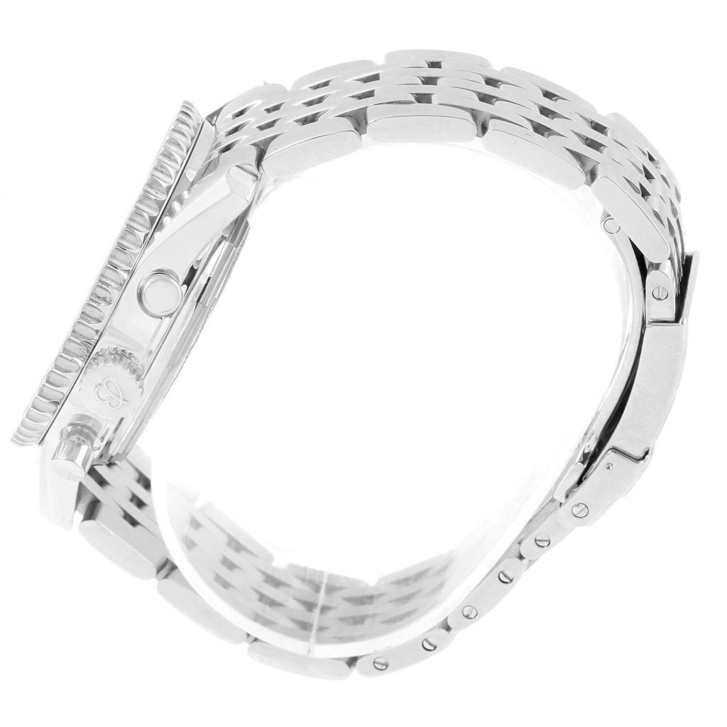 The image shows a Breitling Navitimer AB0130 Men
s Stainless Steel Blue Dial AB0130 Men
s Stainless Steel Blue Dial watch from a side angle, highlighting the crown, pushers, bezel, and metal bracelet.