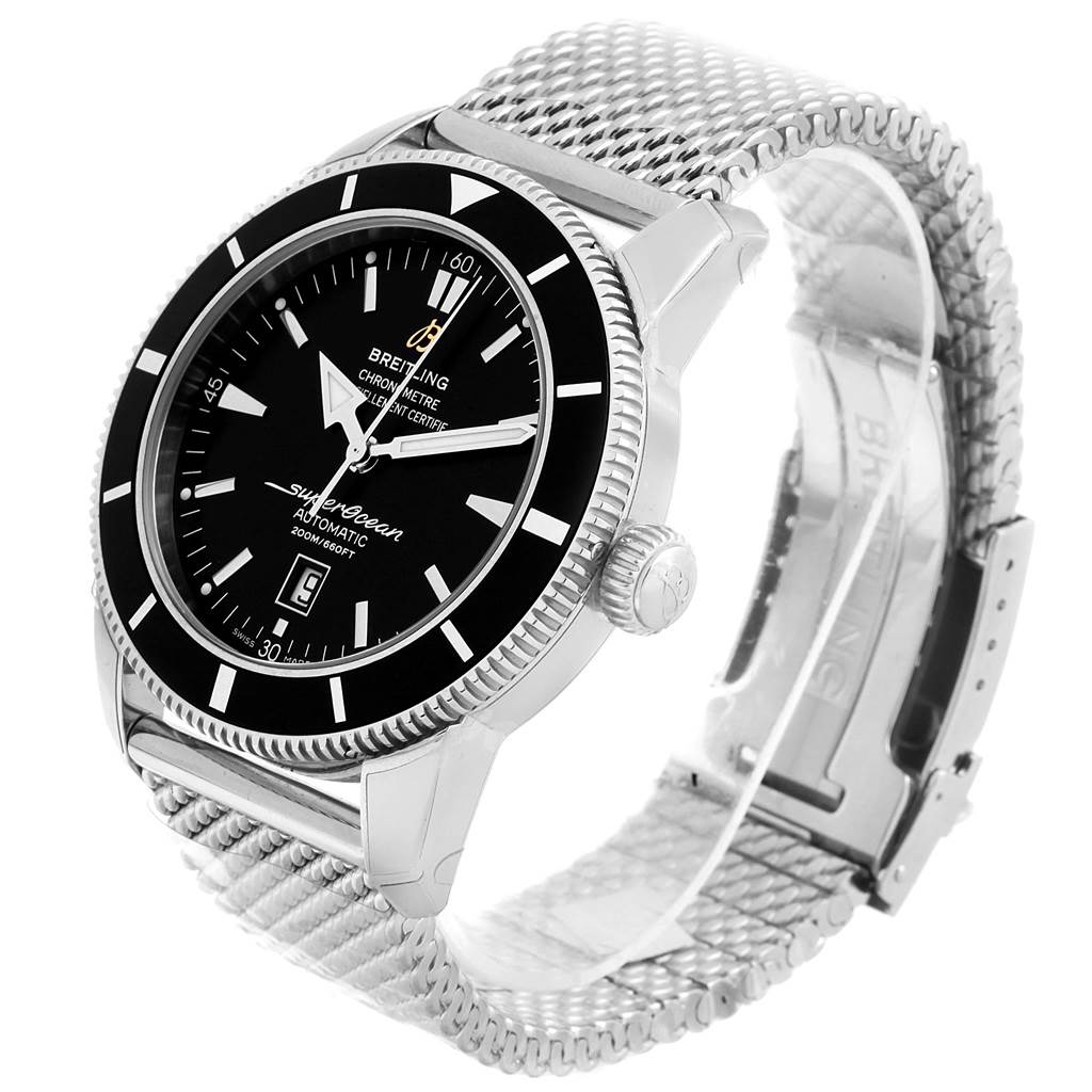 This image shows a Breitling Navitimer A17320 Men
s Stainless Steel Black Dial A17320 Men
s Stainless Steel Black Dial watch at an angled view, displaying its face, case, crown, and mesh bracelet.