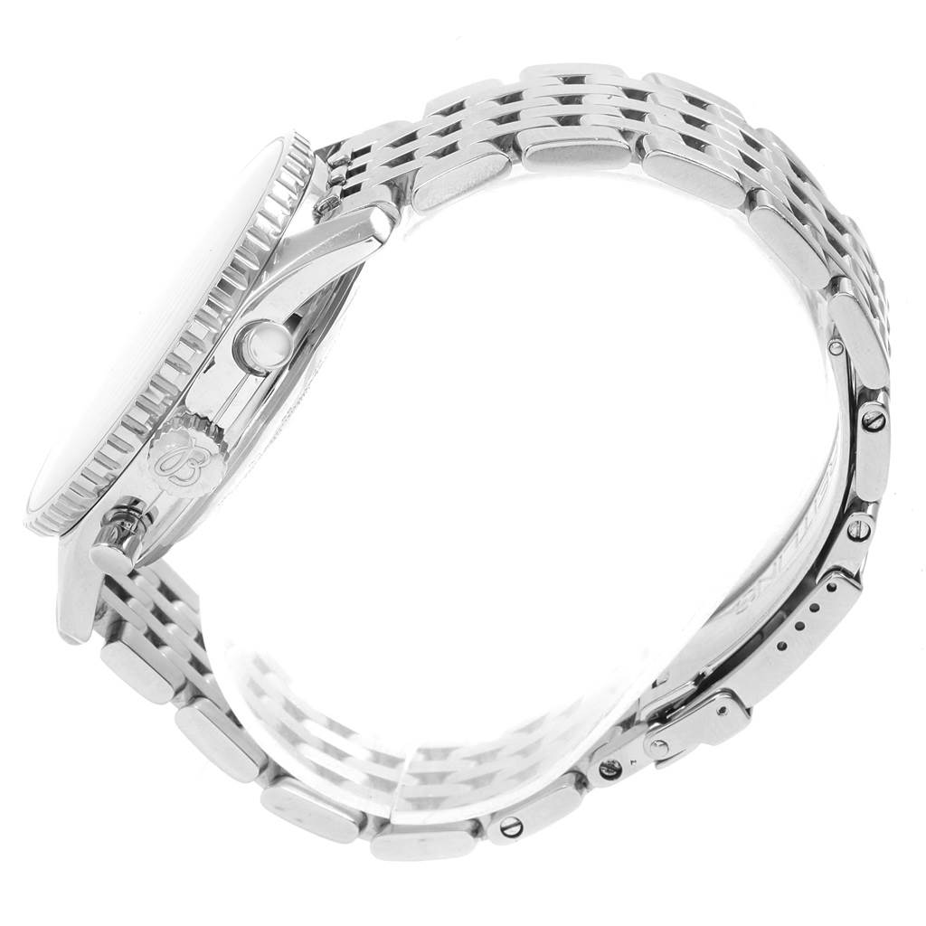 The image shows a side profile of a Breitling Navitimer A13322 Men
s Stainless Steel Black Dial A13322 Men
s Stainless Steel Black Dial watch, highlighting its case, crown, bezel, and metal bracelet.