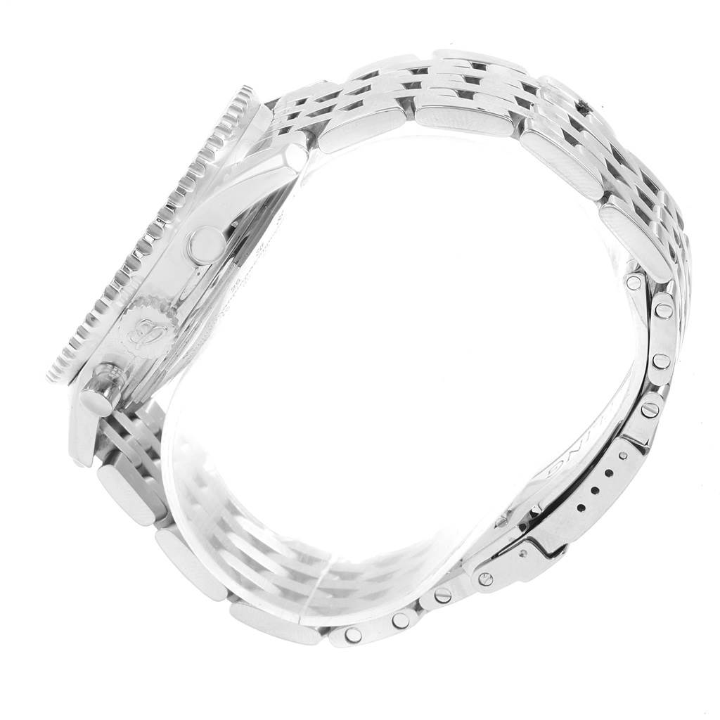 The image shows a side view of the Breitling Navitimer A23322 Men's Stainless Steel Silver Dial A23322 Men's Stainless Steel Silver Dial watch focusing on its case, crown, pushers, and metal bracelet.