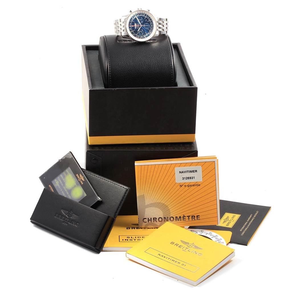 The Breitling Navitimer AB0125 Men's Stainless Steel Blue Dial AB0125 Men's Stainless Steel Blue Dial watch is displayed at an angle, along with its box, manuals, and warranty cards.