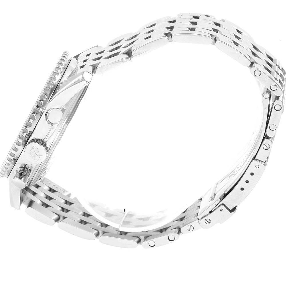 The image shows a side view of a Breitling Navitimer A23322 Men's Stainless Steel Silver Dial A23322 Men's Stainless Steel Silver Dial watch, focusing on its crown and stainless steel bracelet.