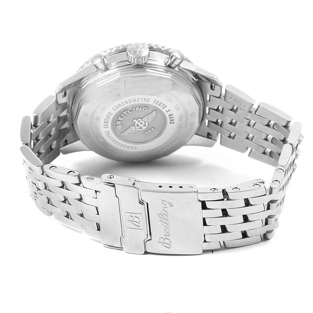 The image shows the backside and clasp of a Breitling Navitimer A23322 Men's Stainless Steel Silver Dial A23322 Men's Stainless Steel Silver Dial watch, highlighting the watch's bracelet and engraved case back.