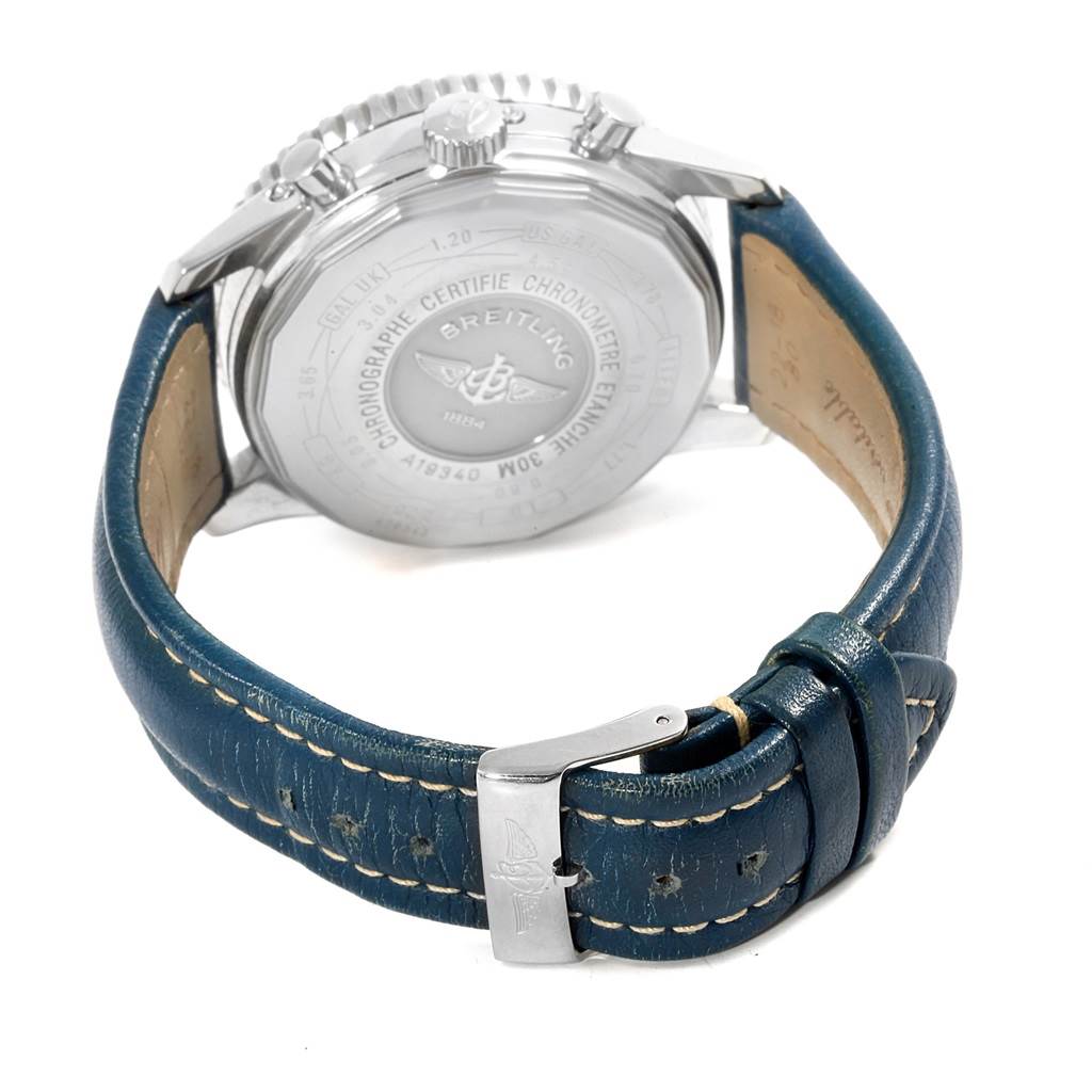 The image shows the back view of a Breitling Navitimer A19340 Men's Stainless Steel Blue Dial A19340 Men's Stainless Steel Blue Dial watch with its leather strap and clasp visible.