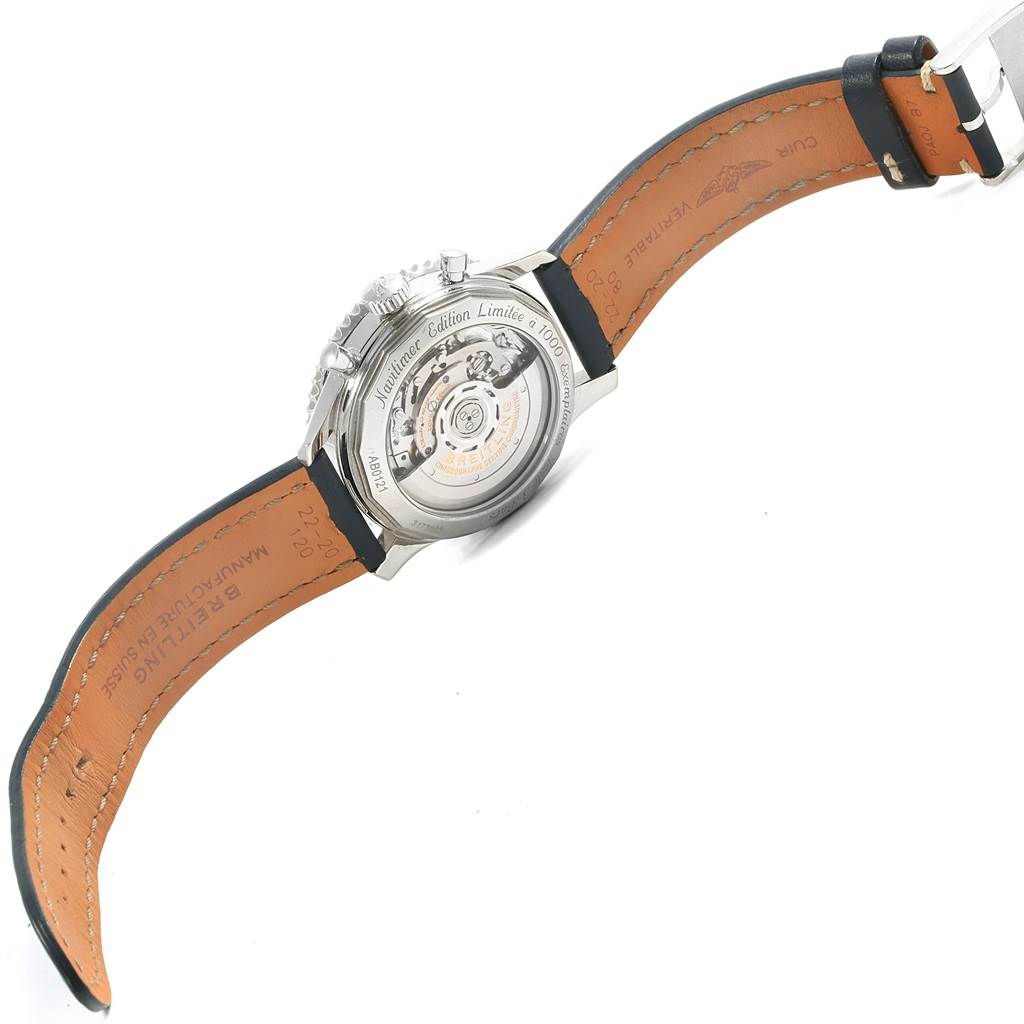 This image shows the back view of a Breitling Navitimer AB0121 Men's Stainless Steel Blue Dial AB0121 Men's Stainless Steel Blue Dial watch, highlighting the open case back and leather strap.