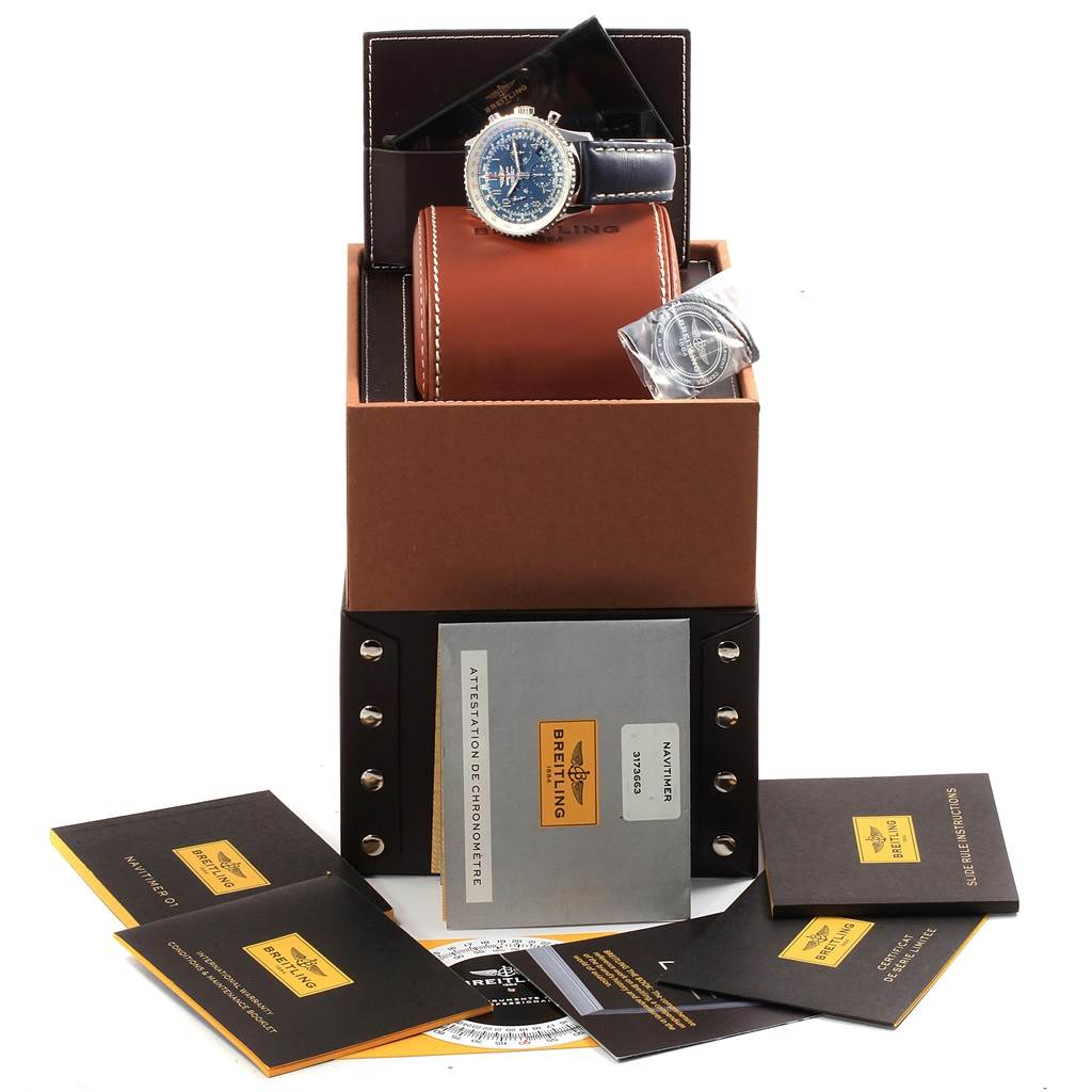 The image shows a Breitling Navitimer AB0121 Men's Stainless Steel Blue Dial AB0121 Men's Stainless Steel Blue Dial watch with its packaging, including manuals, certificates, and a leather watch case.