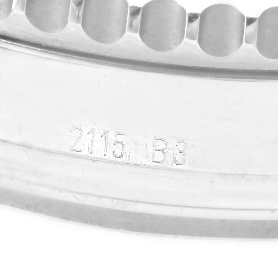 The image shows a close-up of the bezel edge and part number engraving of a Breitling Navitimer AB0121 Men's Stainless Steel Blue Dial AB0121 Men's Stainless Steel Blue Dial watch.
