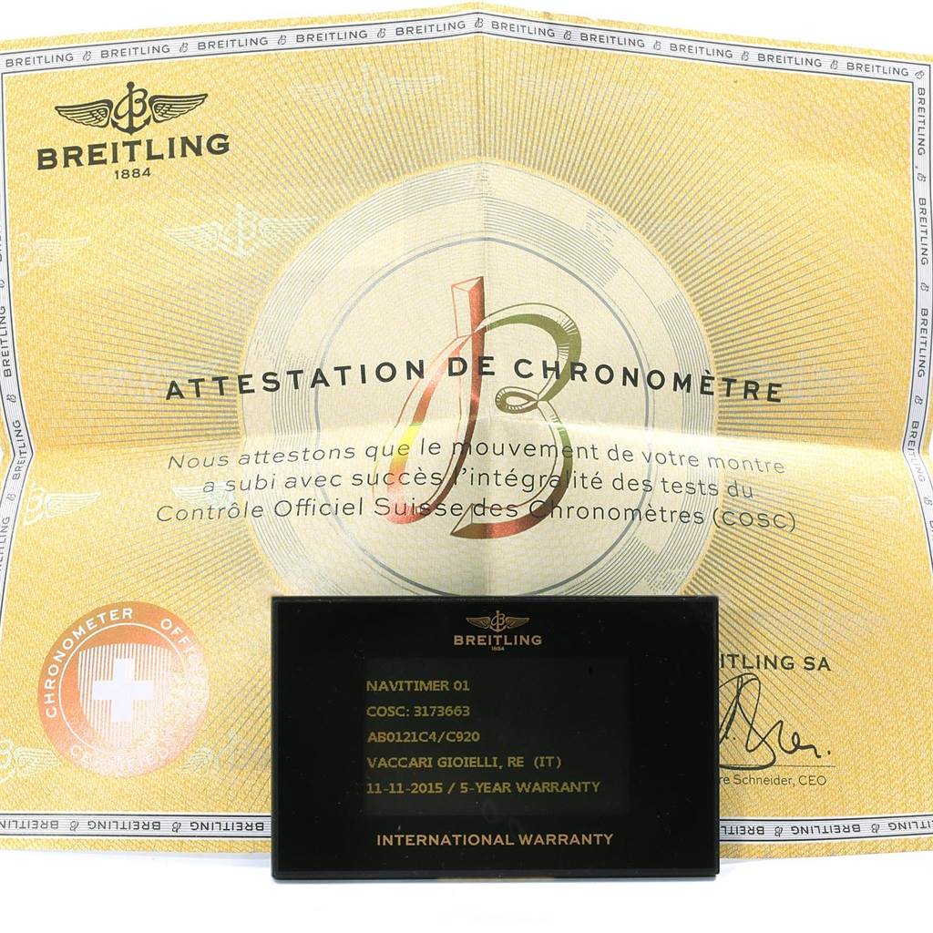 The image shows the certificate of authenticity and the international warranty card for the Breitling Navitimer AB0121 Men's Stainless Steel Blue Dial AB0121 Men's Stainless Steel Blue Dial model watch.