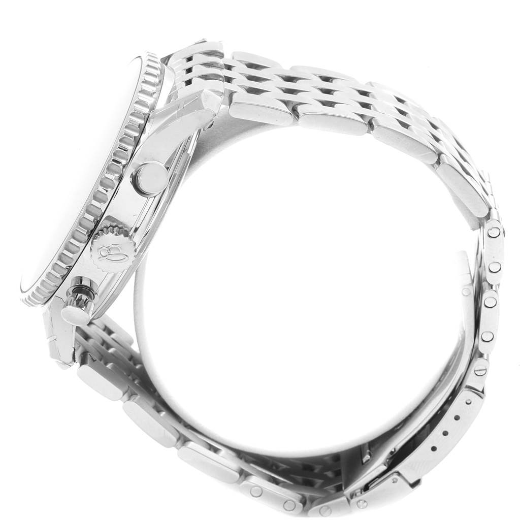 The image shows a side view of the Breitling Navitimer AB012721-BD09SS Men
s Stainless Steel Black Dial AB012721-BD09SS Men
s Stainless Steel Black Dial watch, highlighting the crown, pushers, bezel, and metal bracelet.