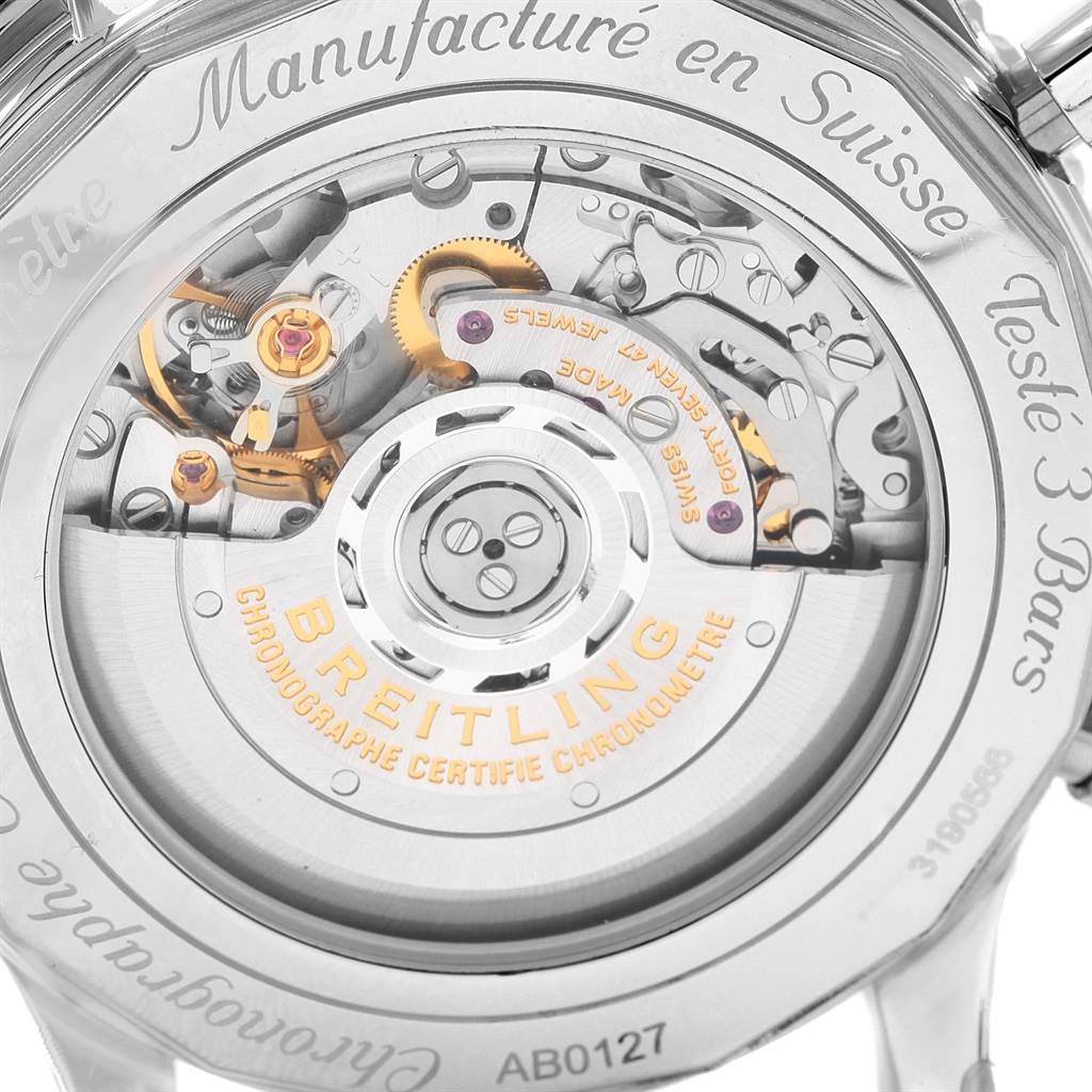 The image shows the case back of a Breitling Navitimer AB012721-BD09SS Men
s Stainless Steel Black Dial AB012721-BD09SS Men
s Stainless Steel Black Dial, focusing on its movement and inner mechanical parts.