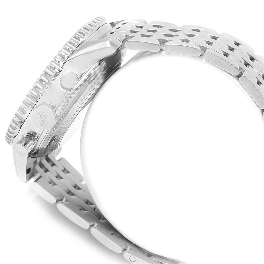 This image shows a side view of a Breitling Navitimer AB044121-G783-453A Men
s Stainless Steel Silver Dial AB044121-G783-453A Men
s Stainless Steel Silver Dial watch, highlighting its bezel, crown, and stainless steel bracelet.