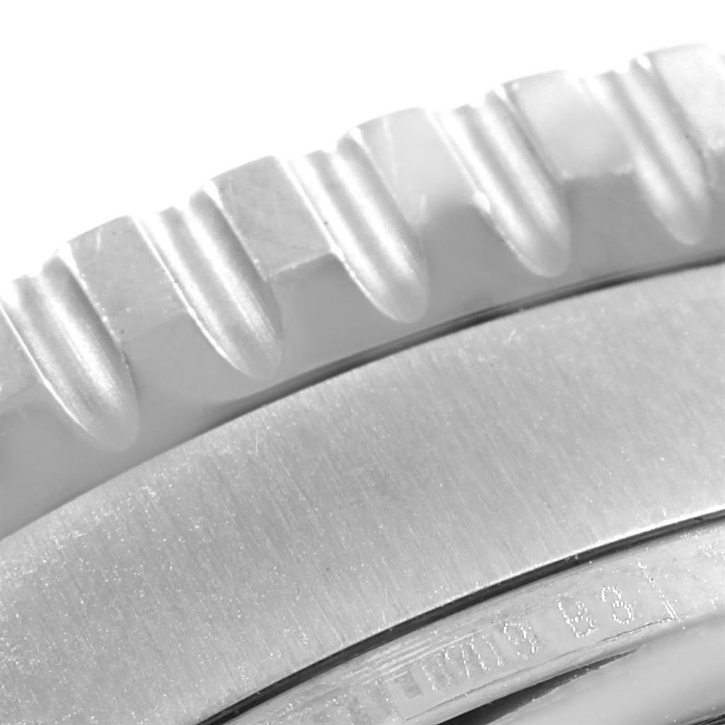 This close-up image shows the textured bezel of a Breitling Navitimer A26322 Men's Stainless Steel Black Dial A26322 Men's Stainless Steel Black Dial watch.