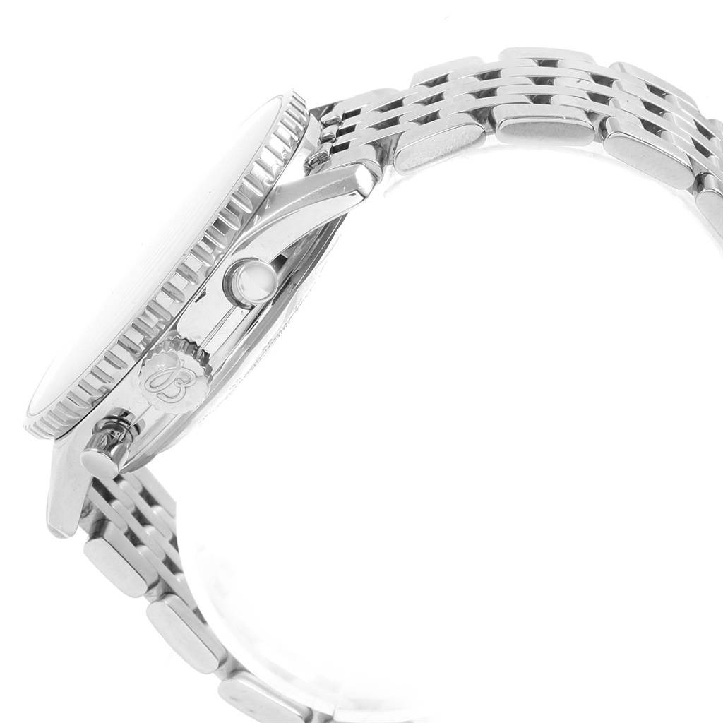 This image shows a side view of the Breitling Navitimer A13322 Men
s Stainless Steel Black Dial A13322 Men
s Stainless Steel Black Dial watch, focusing on the crown, pushers, and metal bracelet.