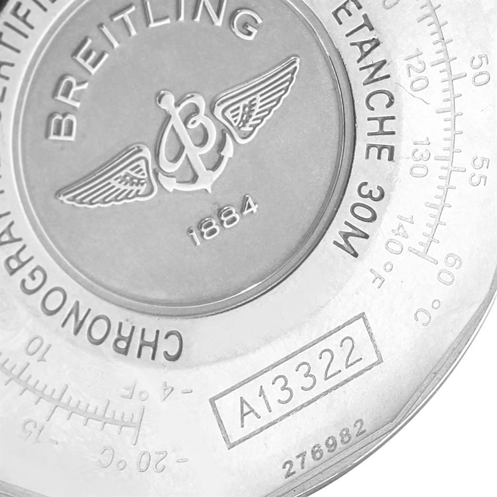 This image shows a close-up of the back casing of a Breitling Navitimer A13322 Men
s Stainless Steel Black Dial A13322 Men
s Stainless Steel Black Dial watch, highlighting the logo, model number, and some specifications.
