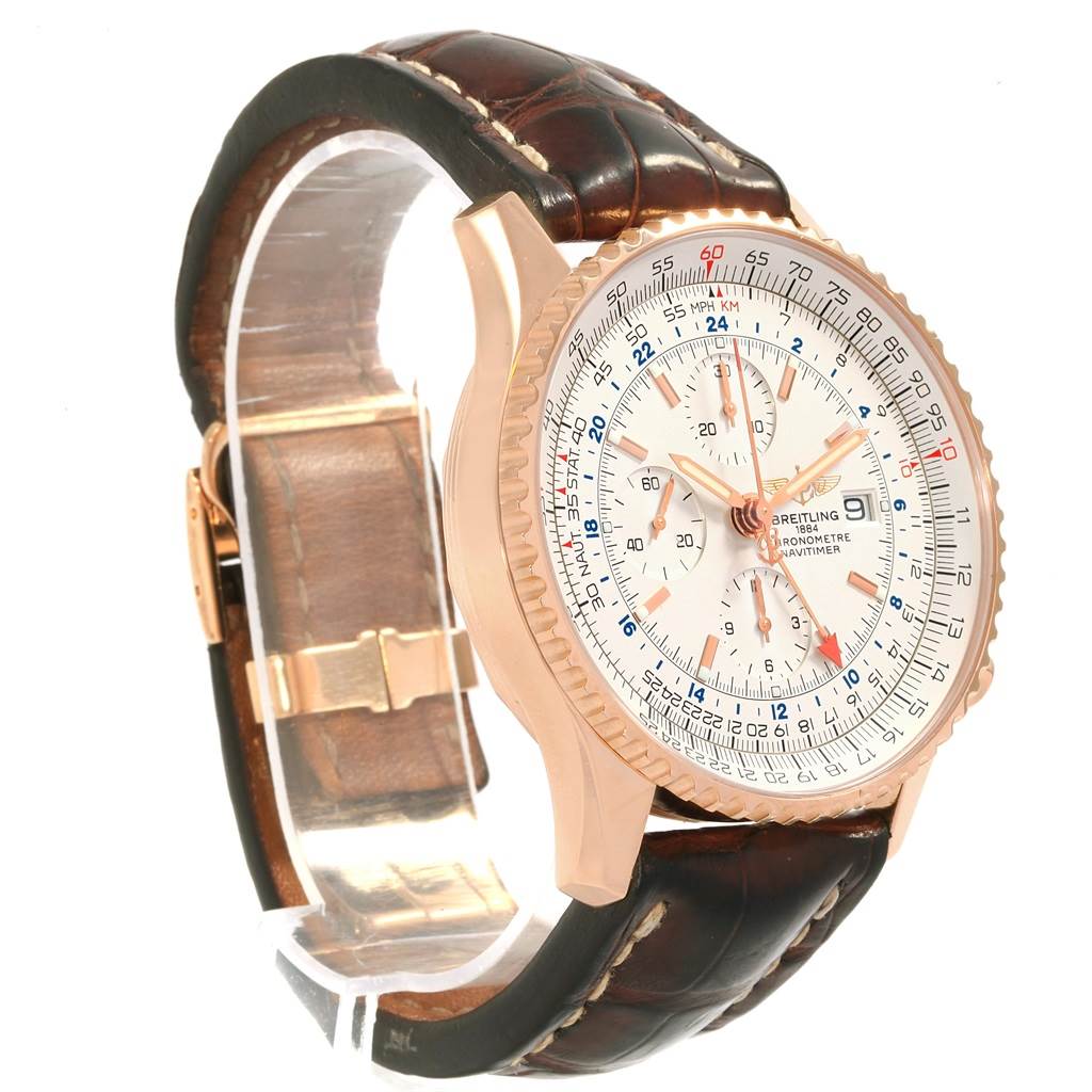 The image shows a side angle of a Breitling Navitimer H24322 Men's Rose Gold Silver Dial H24322 Men's Rose Gold Silver Dial watch displaying the dial, bezel, and strap.