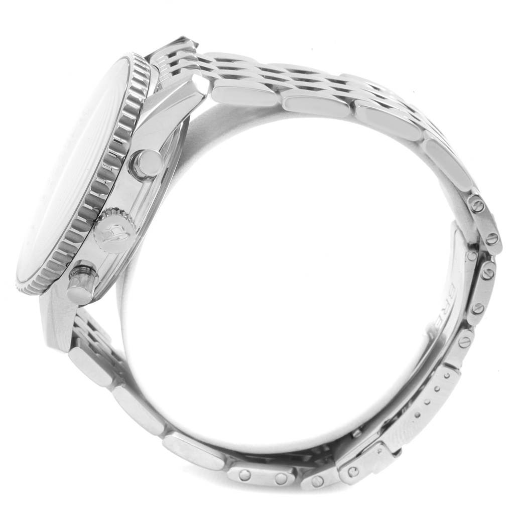 The image shows a side view of a Breitling Navitimer A48330 Men
s Stainless Steel Black Dial A48330 Men
s Stainless Steel Black Dial watch, detailing the crown, pushers, case, and metal bracelet.