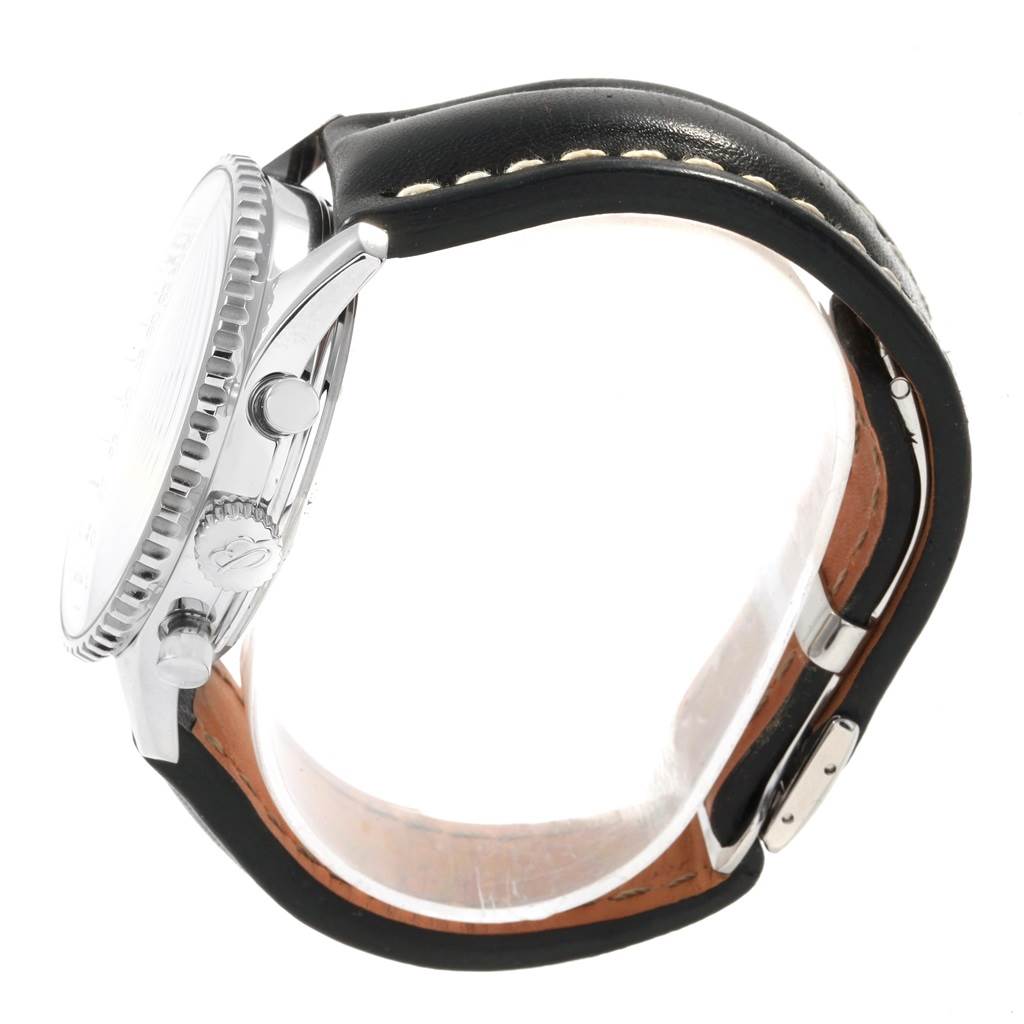 The side view of the Breitling Navitimer A23322 Men
s Stainless Steel Black Dial A23322 Men
s Stainless Steel Black Dial watch shows the crown, pushers, and part of the leather strap with stitching details.