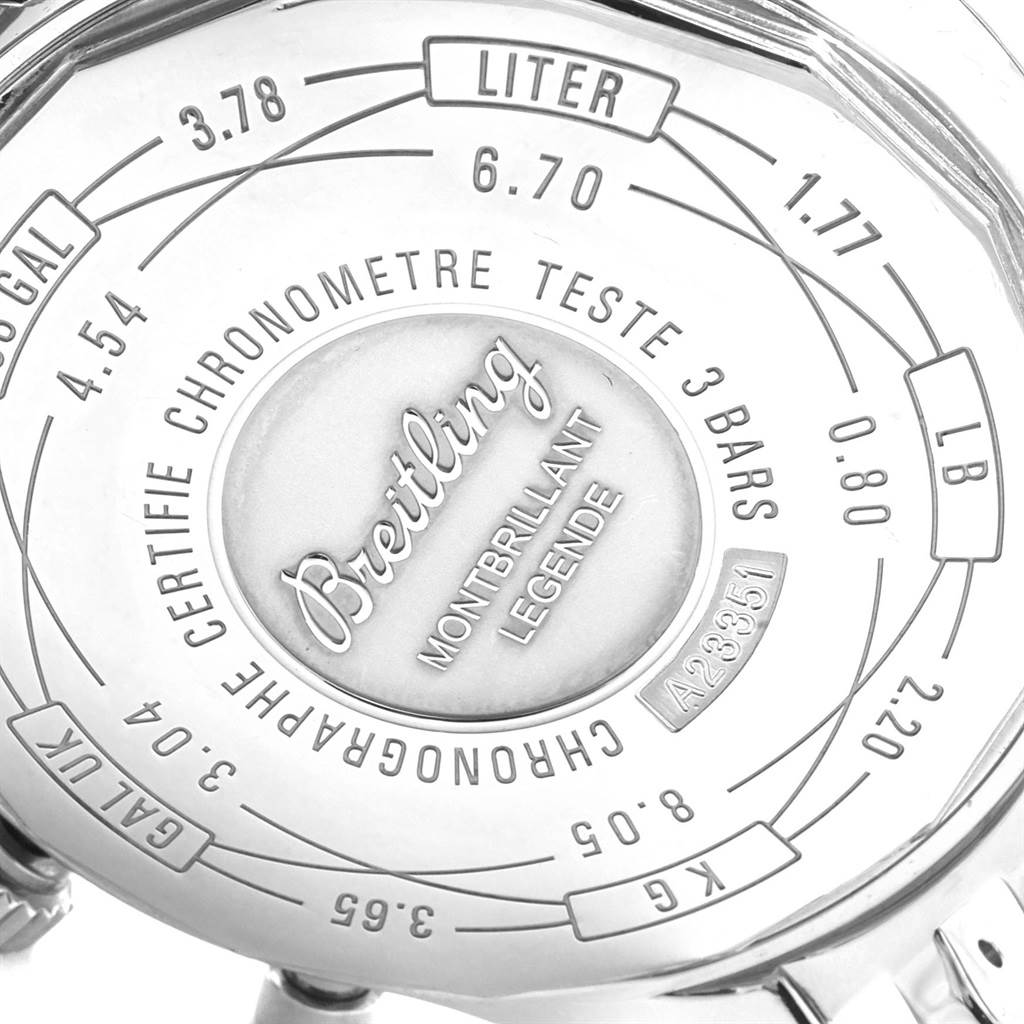 The image shows the rear case of a Breitling Navitimer A23351 Men's Stainless Steel Black Dial A23351 Men's Stainless Steel Black Dial watch with various conversion scales and engraved details.