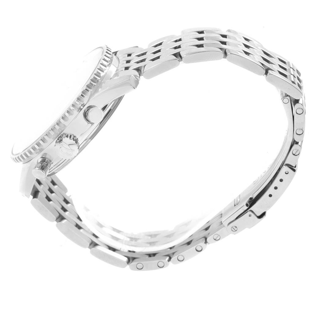 This image shows a side view of a Breitling Navitimer A23322 Men's Stainless Steel Black Dial A23322 Men's Stainless Steel Black Dial watch, highlighting the bezel, crown, pushers, and bracelet.