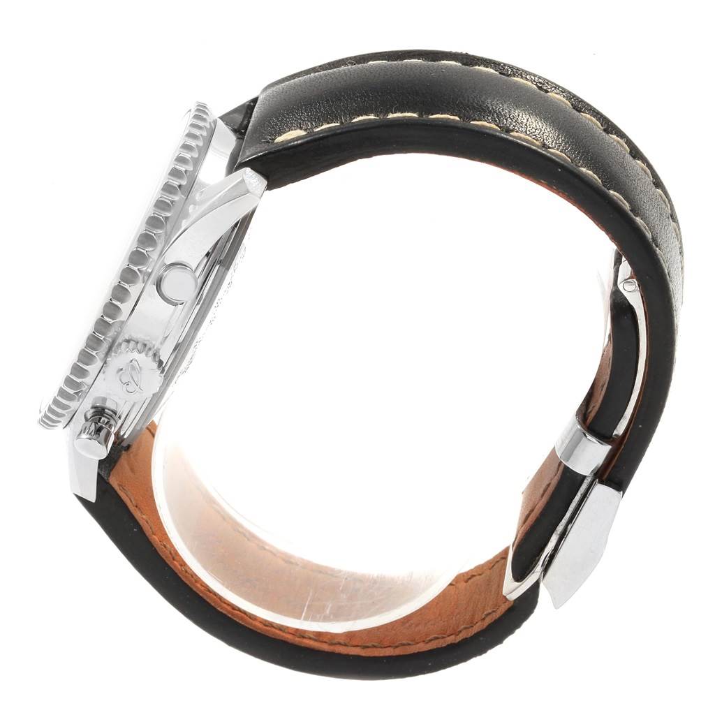 This image shows a side view of a Breitling Navitimer AB0120 Men
s Stainless Steel Black Dial AB0120 Men
s Stainless Steel Black Dial watch, emphasizing the crown, bezel, and leather strap with stitching.