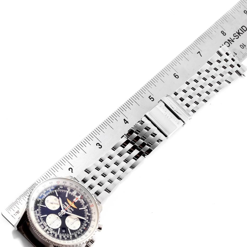 The image shows a top-down view of a Breitling Navitimer AB012721-BD09-453A Men's Stainless Steel Black Dial AB012721-BD09-453A Men's Stainless Steel Black Dial watch focusing on its bracelet, clasp, and part of the case up to the face.