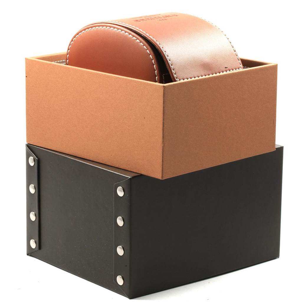 The image shows the packaging box and leather case for a Breitling Navitimer C23340 Men's Steel and Gold (two tone) Brown Dial C23340 Men's Steel and Gold (two tone) Brown Dial watch, viewed from a three-quarter angle.