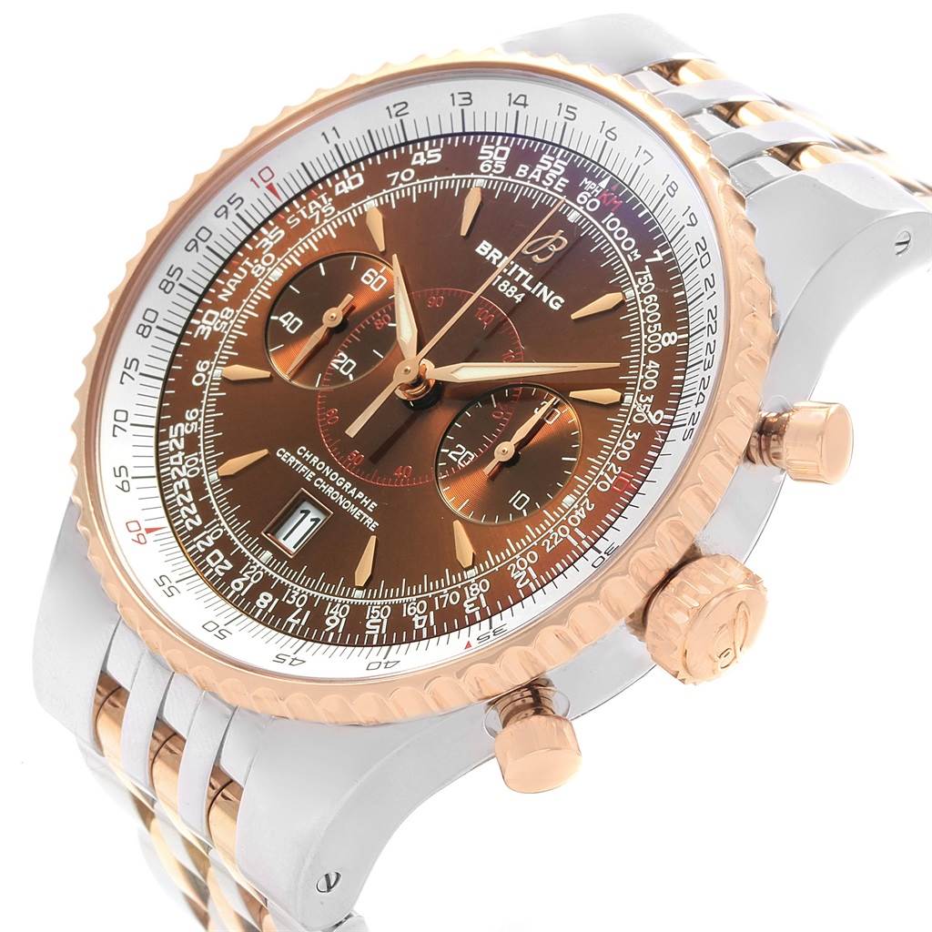 The image shows a partial side angle of the Breitling Navitimer C23340 Men's Steel and Gold (two tone) Brown Dial C23340 Men's Steel and Gold (two tone) Brown Dial watch, highlighting its dial, bezel, and chronograph buttons.