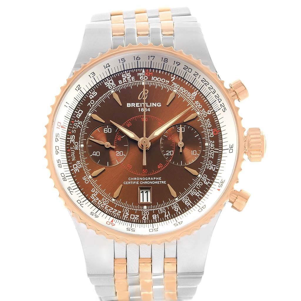 The image shows a front view of a Breitling Navitimer C23340 Men's Steel and Gold (two tone) Brown Dial C23340 Men's Steel and Gold (two tone) Brown Dial watch, featuring its dial, bezel, pushers, and part of its bracelet.