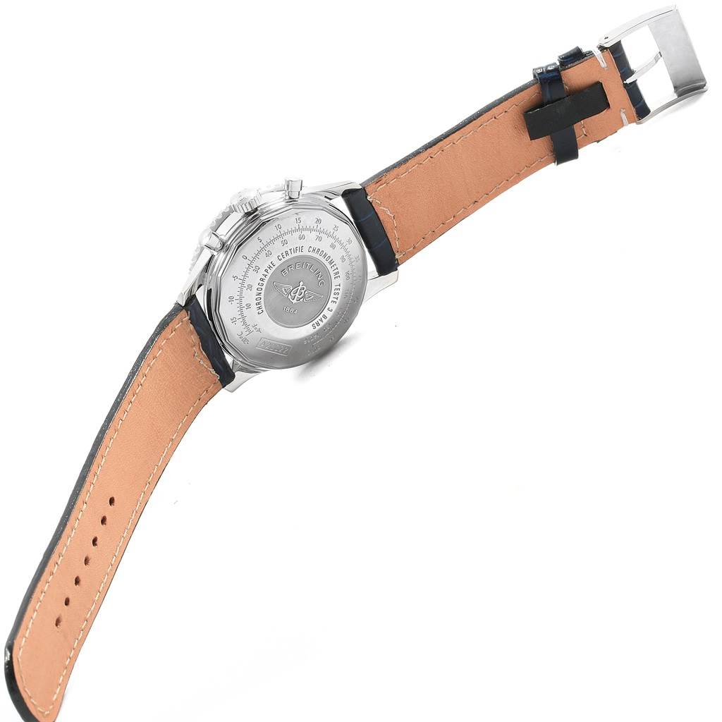 The image shows the back view of a Breitling Navitimer A23322 Men's Stainless Steel Silver Dial A23322 Men's Stainless Steel Silver Dial watch, displaying its leather strap and rear case with embossed details.