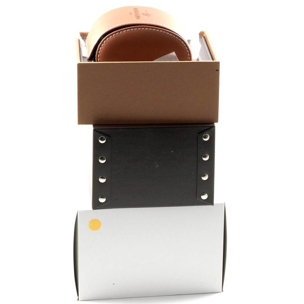 The image shows the boxes and packaging of a Breitling Navitimer A23322 Men's Stainless Steel Black Dial A23322 Men's Stainless Steel Black Dial watch viewed from the side.