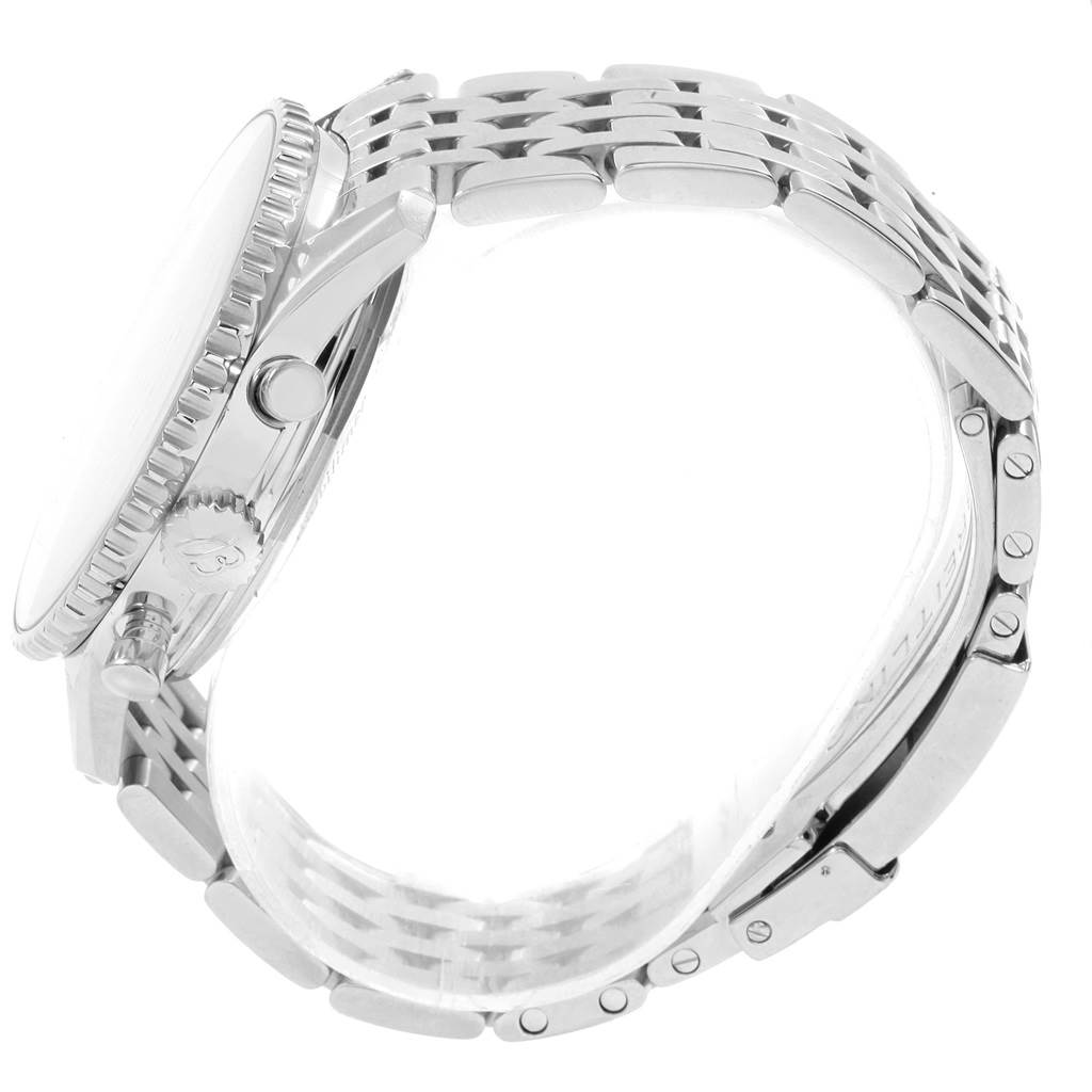 This image shows a side angle of the Breitling Navitimer AB0123 Men's Stainless Steel Silver Dial AB0123 Men's Stainless Steel Silver Dial watch, focusing on the metallic case, crown, pushers, and part of the bracelet.