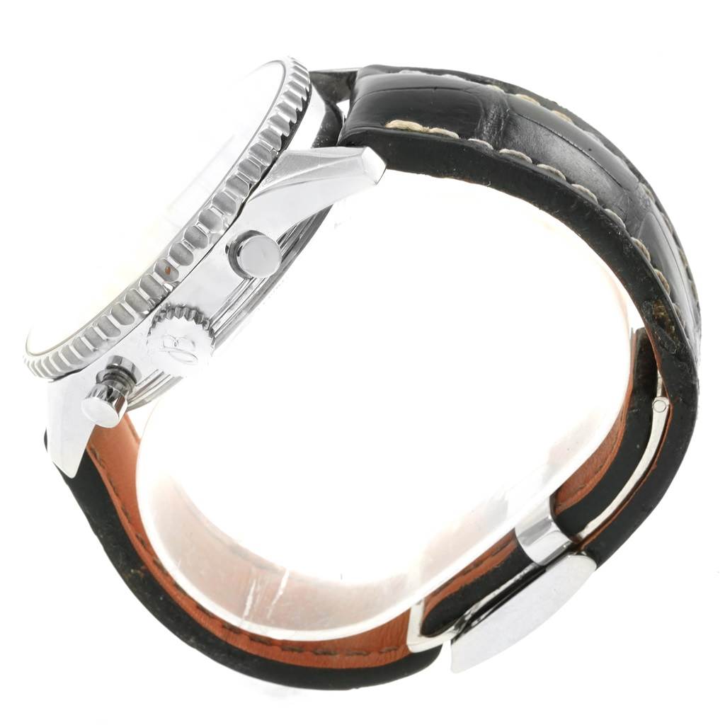 The side view of the Breitling Navitimer AB044121-BD24-442X-A20D.1 Men's Stainless Steel Black Dial AB044121-BD24-442X-A20D.1 Men's Stainless Steel Black Dial watch shows the crown, pushers, case, and leather strap with buckle.